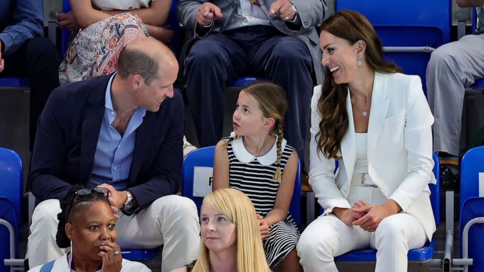 PHOTO: Prince William, Duke of Cambridge, Princess Charlotte of Cambridge and Catherine, Duchess of Cambridge attend the Sandwell Aquatics Centre during the 2022 Commonwealth Games, Aug. 2, 2022, in Birmingham, England.
