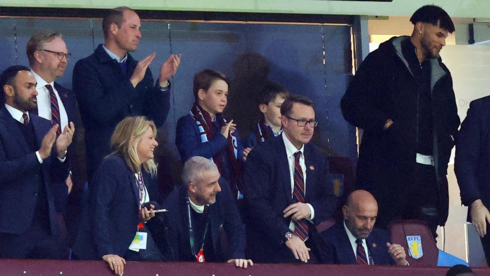 PHOTO: Prince William and Prince George watch Tyrone Mings of Aston Villa during the UEFA Europa Conference League 2023/24 Quarter-final first leg match between Aston Villa and Lille OSC at Villa Park on April 11, 2024 in Birmingham, England.

