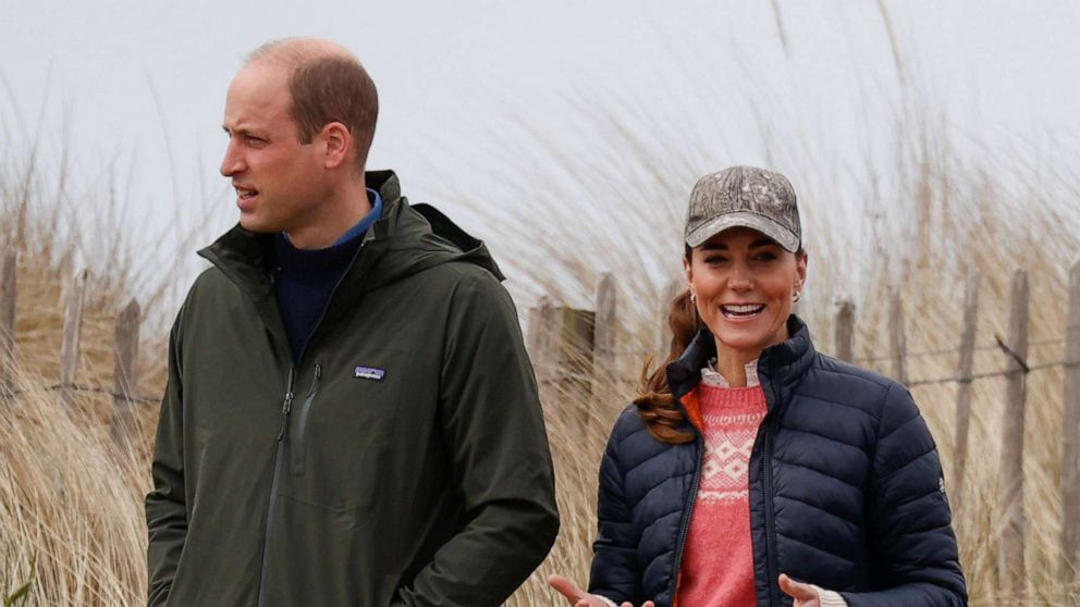PHOTO: Prince William and Catherine, Duchess of Cambridge walk at the beach at St Andrews, Scotland, May 26, 2021.