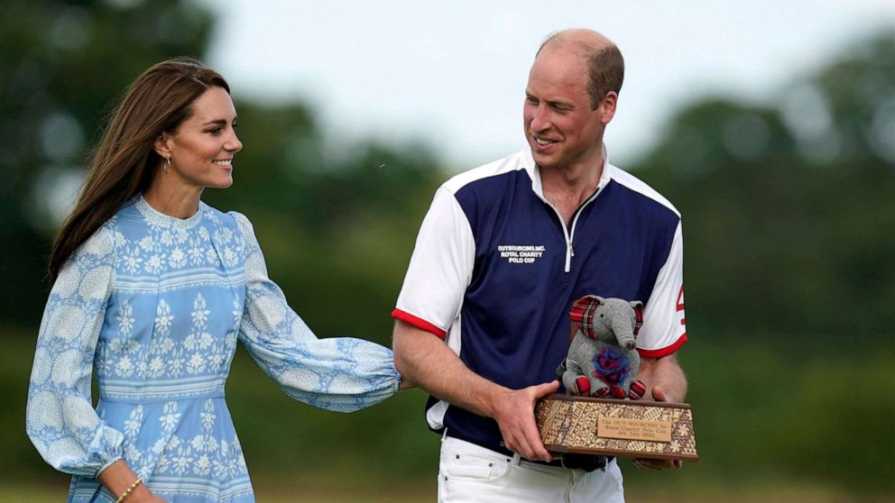 PHOTO: Kate, Princess of Wales and Prince William at the Out-Sourcing Inc Royal Charity Polo Cup 2023 at Guards Polo Club, Windsor, England, July 6, 2023.