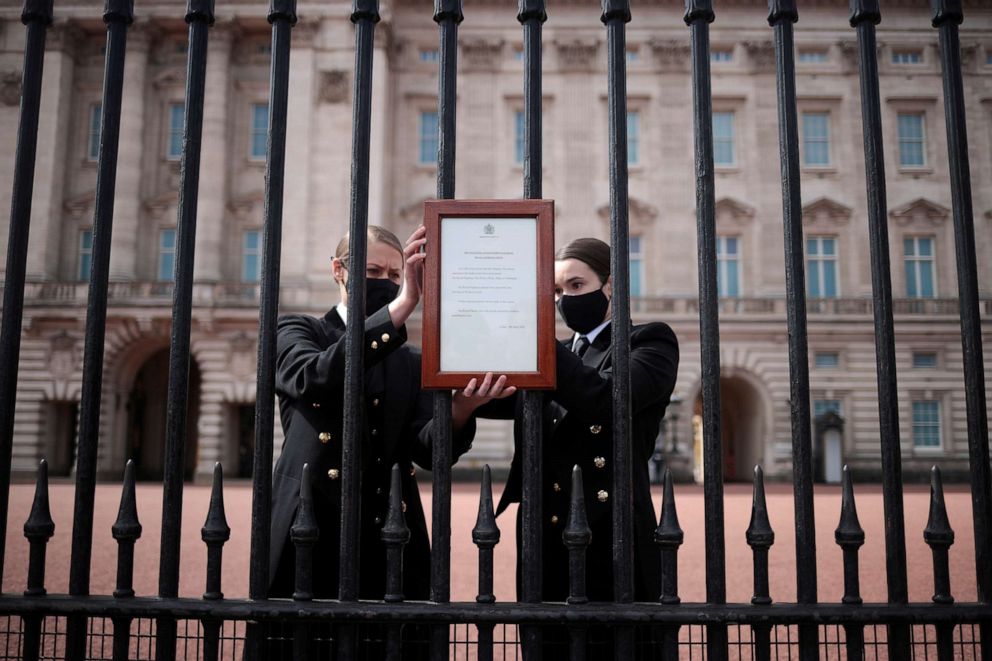 PHOTO: An announcement is attached to the fence of Buckingham Palace after it was announced that Britain's Prince Philip, husband of Queen Elizabeth, has died at the age of 99, in London, April 9, 2021.