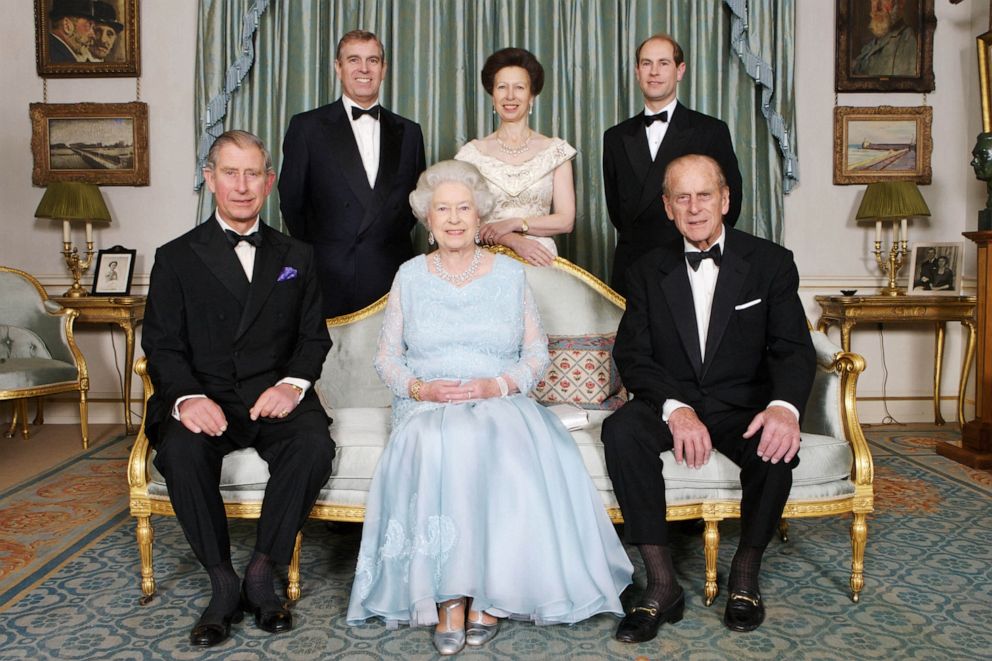 Britain's Queen Elizabeth II (bottom center), Prince Philip (bottom right), Prince Charles (bottom left), Prince Edward (back right), Princess Anne (back center), and Prince Andrew (back left) are pictured at Clarence House in London on Nov. 18, 2007.
