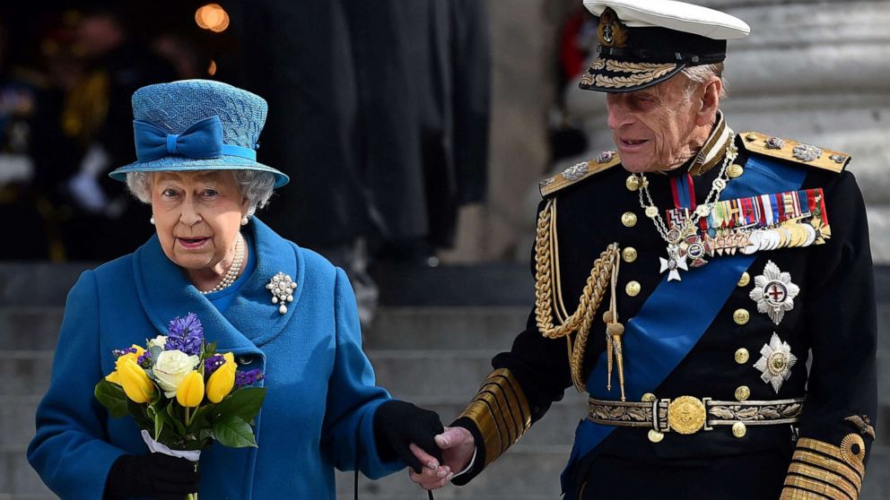 PHOTO: In this file photo taken on March 13, 2015 Britain's Queen Elizabeth II and Britain's Prince Philip, Duke of Edinburgh, leave St Paul's Cathedral in London on March 13, 2015.