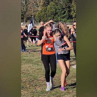 PHOTO: Kaylee Montgomery helped a fellow runner whose legs gave out across the finish line during the last race of her high school career.