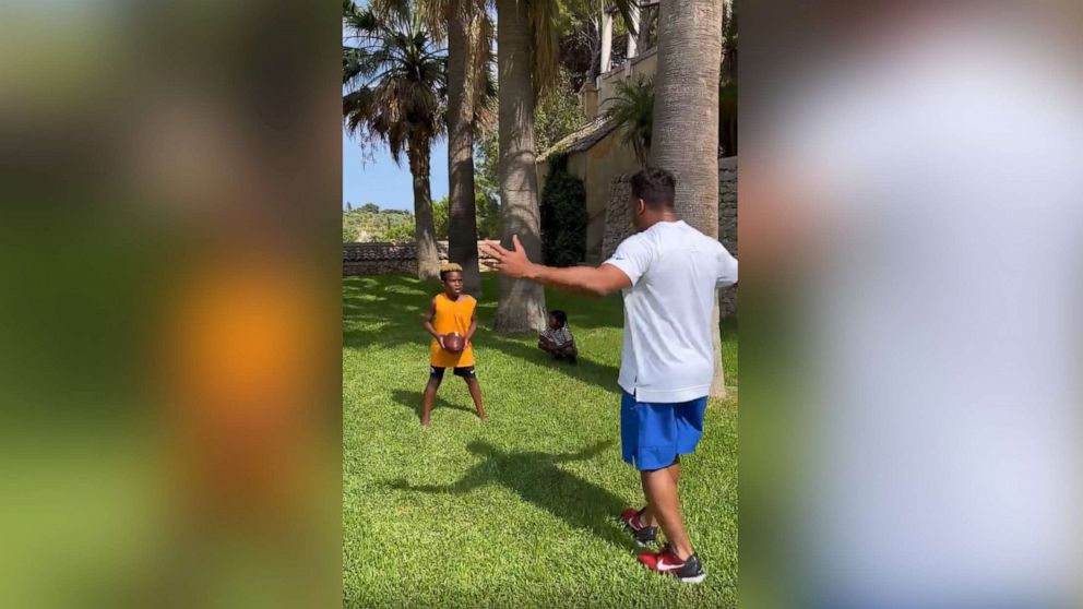 Russell Wilson Runs Football Drill with Son Future and Friend