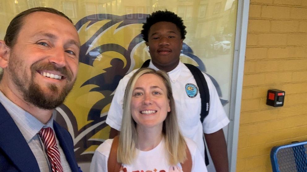 PHOTO: Petey Jones, 17, poses with Ryan Holdren and his wife Caitlin.