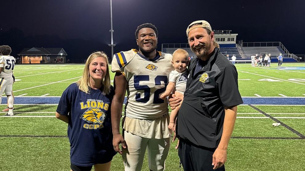 PHOTO: Petey Jones, 17, poses with Ryan Holdren and his wife Caitlin and their 10-month-old son Everett.