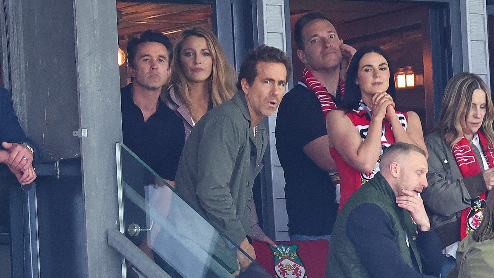 PHOTO: Ryan Reynolds, co-owner of Wrexham A.F.C., watches on with Rob McElhenney and wife Blake Lively ahead of the Sky Bet League One match between Wrexham A.F.C. and Charlton Athletic F.C. on April 26, 2025 in Wrexham, Wales.