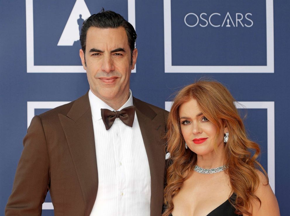 PHOTO: Sacha Baron Cohen and Isla Fisher arrive to attend a screening of the Oscars on April 26, 2021 in Sydney. 