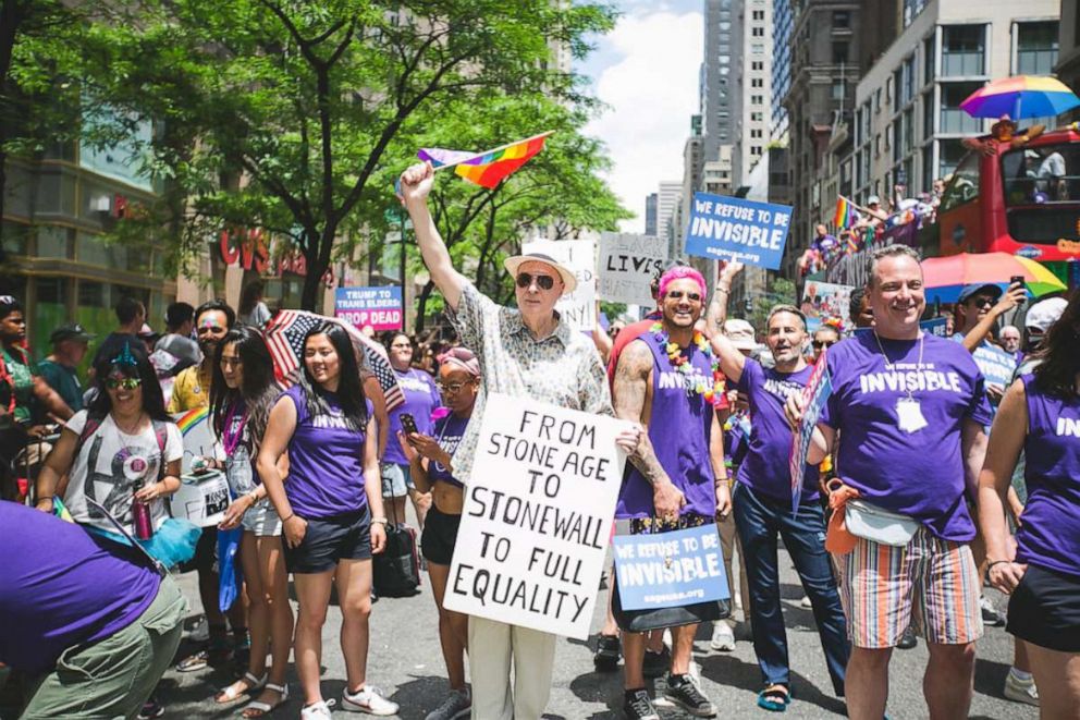PHOTO: Gay seniors and supporters walk with SAGE at the New York City Pride March, June 25, 2017.