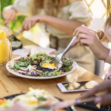 PHOTO: People eat salads at a restaurant in an undated stock photo. 