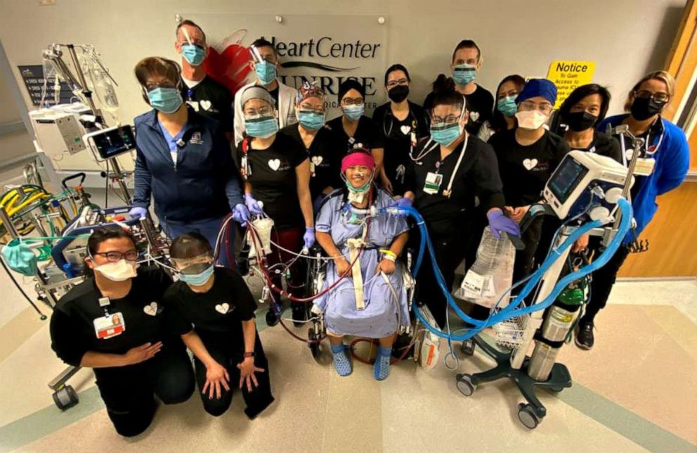 PHOTO: Rowena Salas, center, poses with members of the medical team that cared for her at Sunrise Hospital in Las Vegas.