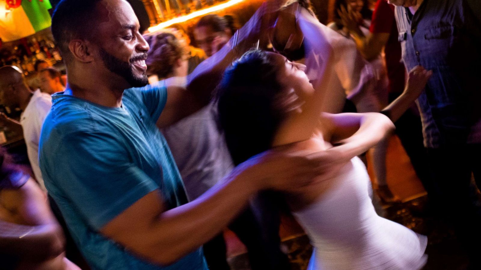 PHOTO: Pierre Bennett spins Joanna Mendez on the dance floor of The Lucky Bar on salsa night at the bar, on Aug. 7, 2017 in Washington, D.C.