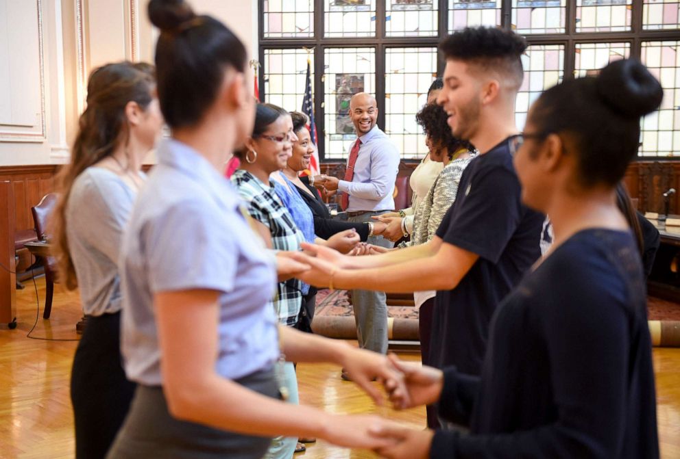 PHOTO: City Hall employees dance salsa on Sept. 28, 2016, in Reading, Pa., to promote an upcoming Dance on the Street event. 