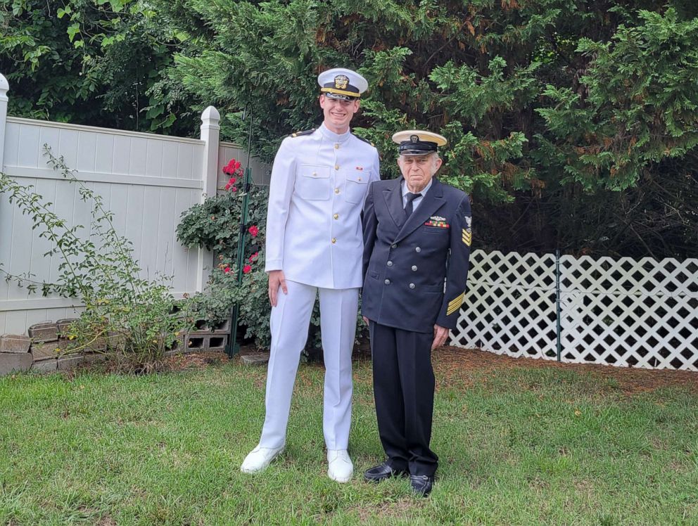 PHOTO: Gail Allen, right, a U.S. Navy veteran, poses with his grandson Ensign Nicholas Allen.
