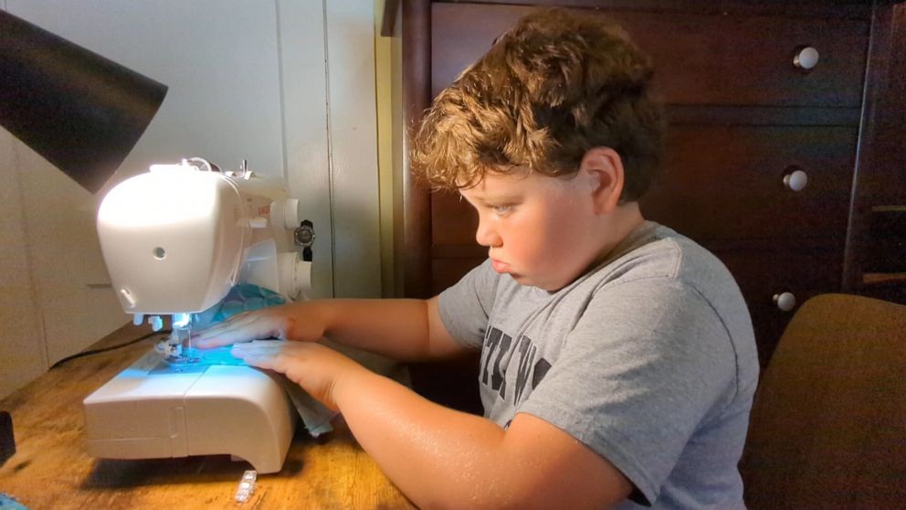 PHOTO: Aaron Gouveia said his son Sam, now 9, loves to sew and has made multiple creations, including PJ pants, scrunchies, a dress and now a shirt as well.