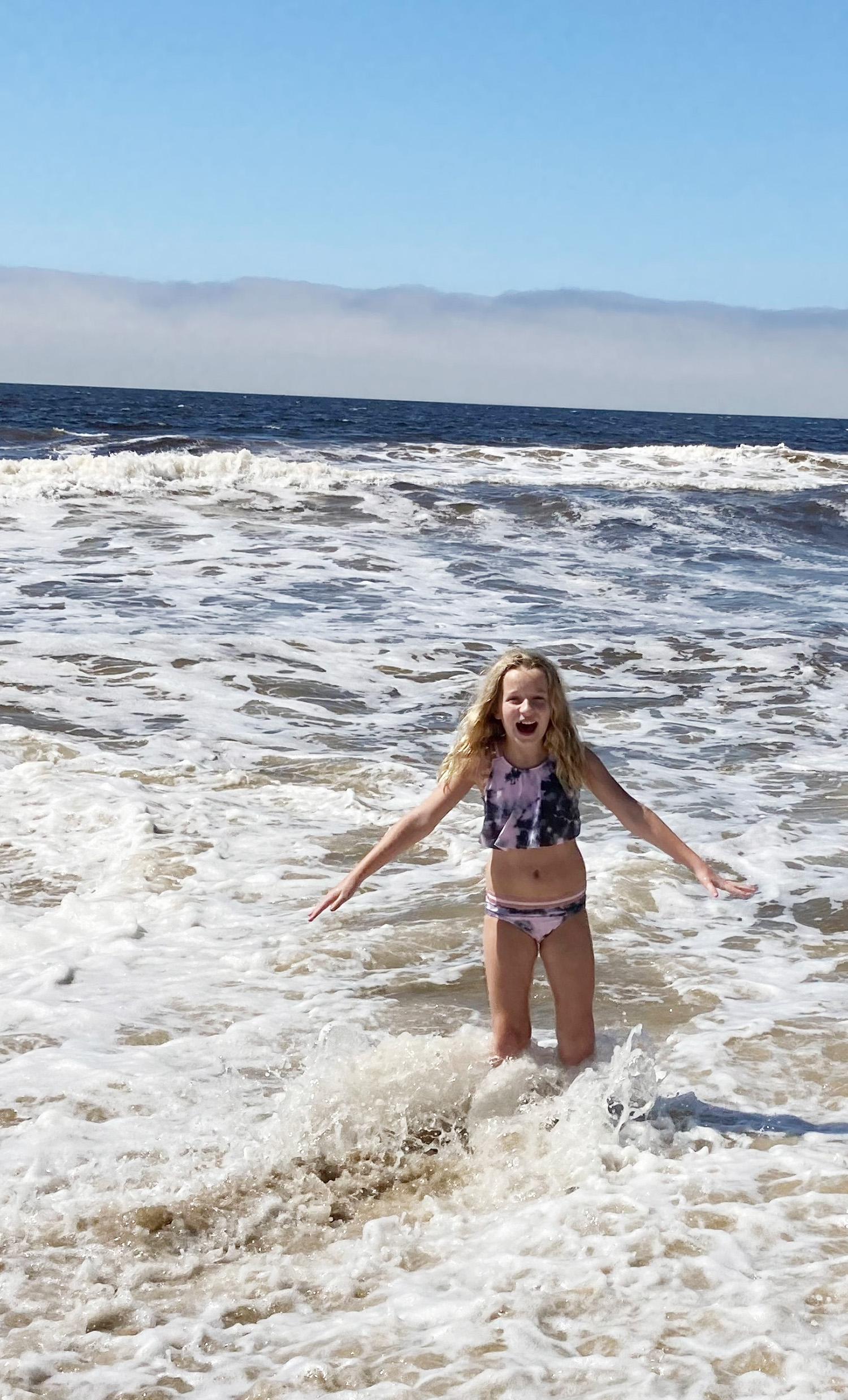 PHOTO: Haylee Whiting, 10, of Texas, plays in the ocean off the coast of California.