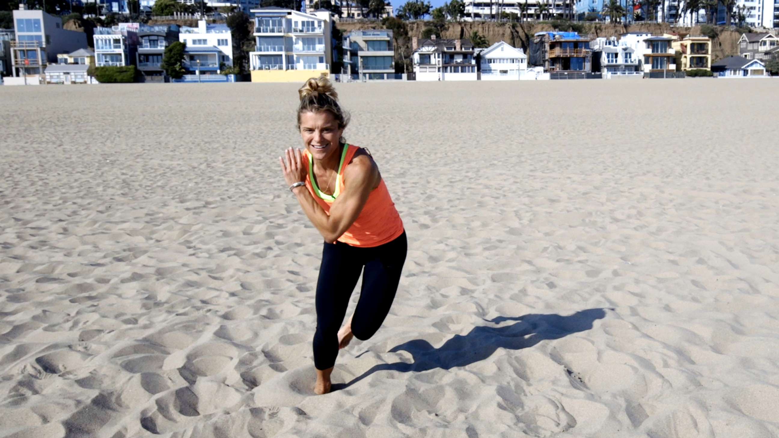 PHOTO: Nike master trainer Holly Rilinger demonstrates a sand workout.