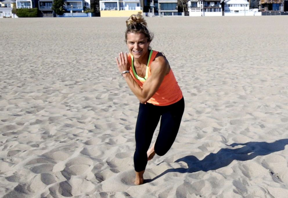 PHOTO: Nike master trainer Holly Rilinger demonstrates a sand workout.