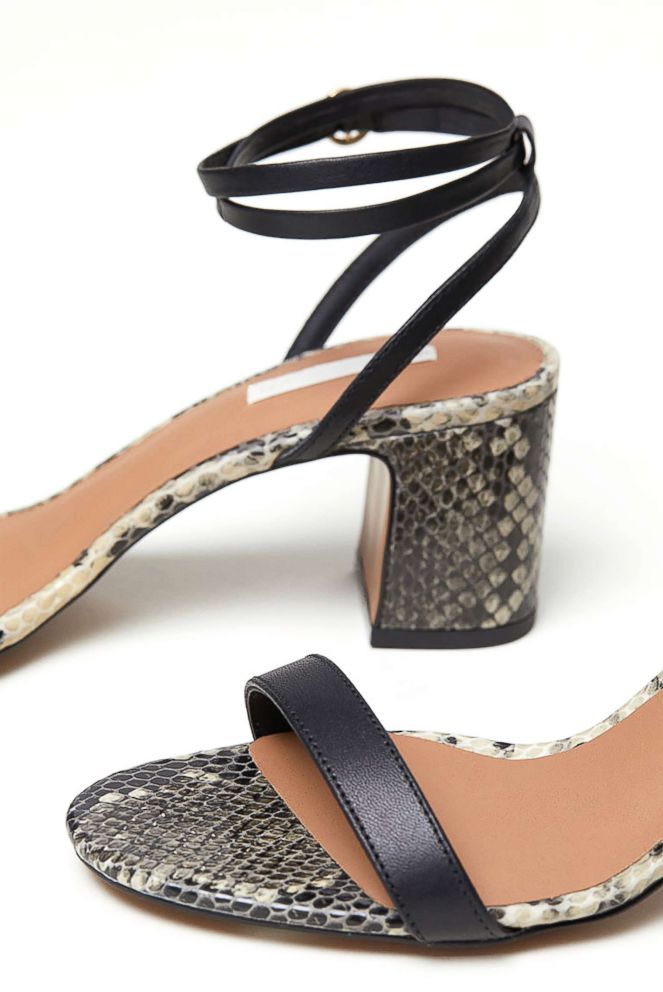 PHOTO: Style Hint: Have you heard the big news: Fall is all about comfortable shoes (not unhappy feet in heels). Embrace a lower heel in chic snakeskin that can be worn with a variety prints fearlessly-- and never look back. Bye-bye high heels.