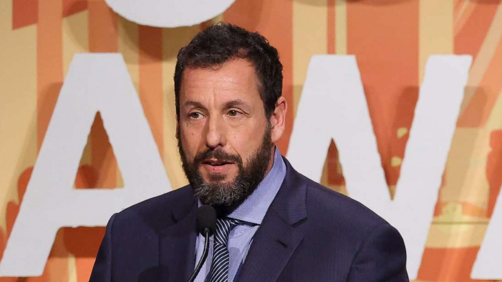 PHOTO: Adam Sandler accepts the Film Tribute Award onstage during The 2022 Gotham Awards at Cipriani Wall Street, Nov. 28, 2022, in New York.