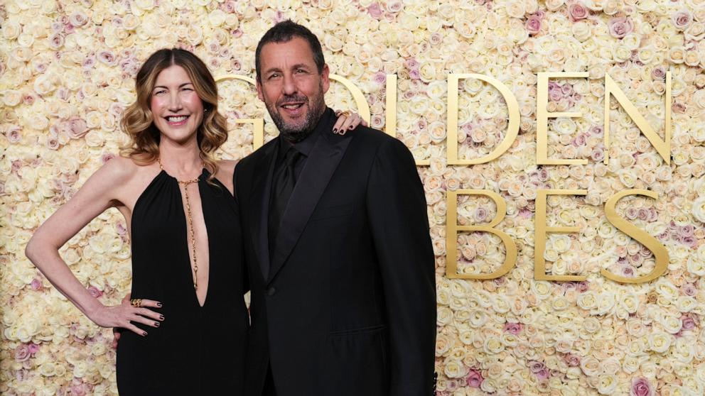 PHOTO: Jackie Sandler, left, and Adam Sandler arrive at the 82nd Golden Globes, Jan. 5, 2025, in Beverly Hills.