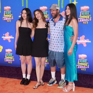 PHOTO: Sadie Sandler, Jackie Sandler, Adam Sandler and Sunny Sandler pose on the orange carpet for the 37th Annual Nickelodeon Kids' Choice Awards at The Barker Hangar in Santa Monica, Calif., July 13, 2024. 