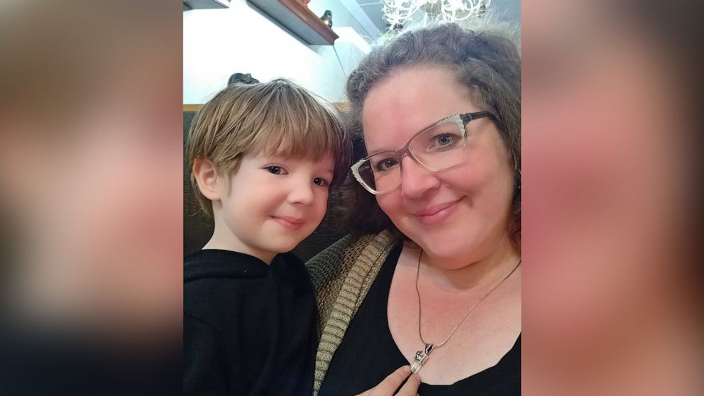 PHOTO: Sarah Hutchinson, 45, a librarian from Fredericksburg, Virginia, holds her 5-year-old son.