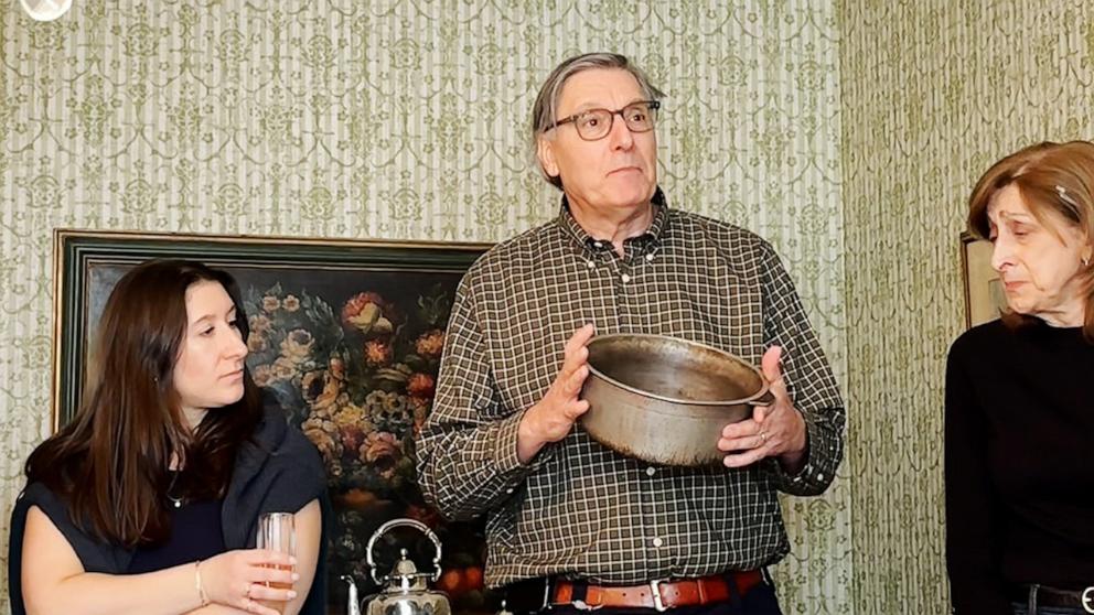 PHOTO: Maddy DeVita's uncle gifting his mother's beloved sauce pot at a family gathering celebrating her 96 years of life.