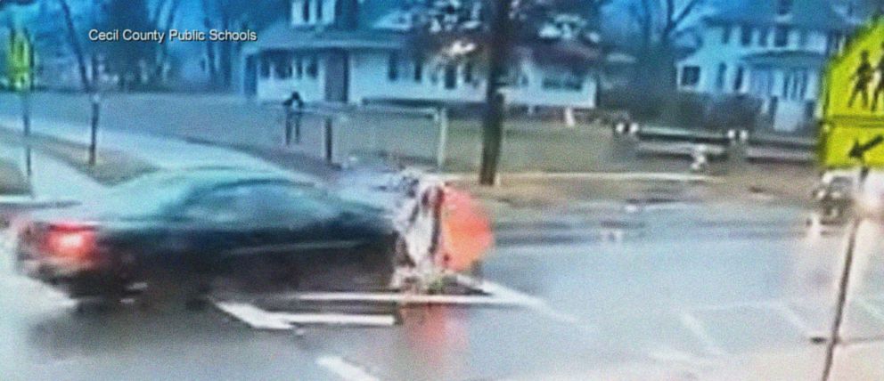 PHOTO: Crossing guard Corporal Annette Goodyear is shown moving aside 11-year-old Violet Watt, preventing her from being hit by a speeding vehicle in an image from video released by Cecil County Public Schools. 