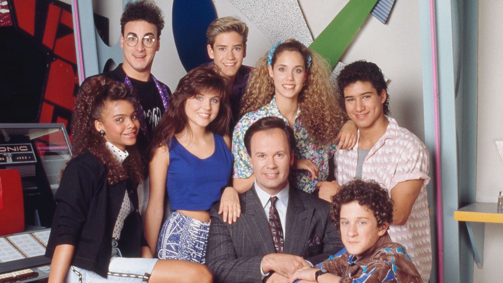 PHOTO: Lark Voorhies, Ed Alonzo, Tiffani Thiessen, Mark-Paul Gosselaar, Dennis Haskins, Elizabeth Berkley, Dustin Diamond and Mario Lopez pose for a promotional image for the show "Saved by the Bell."