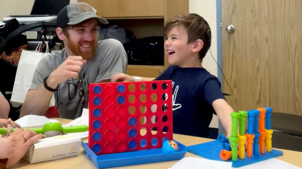 PHOTO: Sawyer, a 4-year-old from Canada, hears his family's voices for the first time after undergoing cochlear implant surgery.