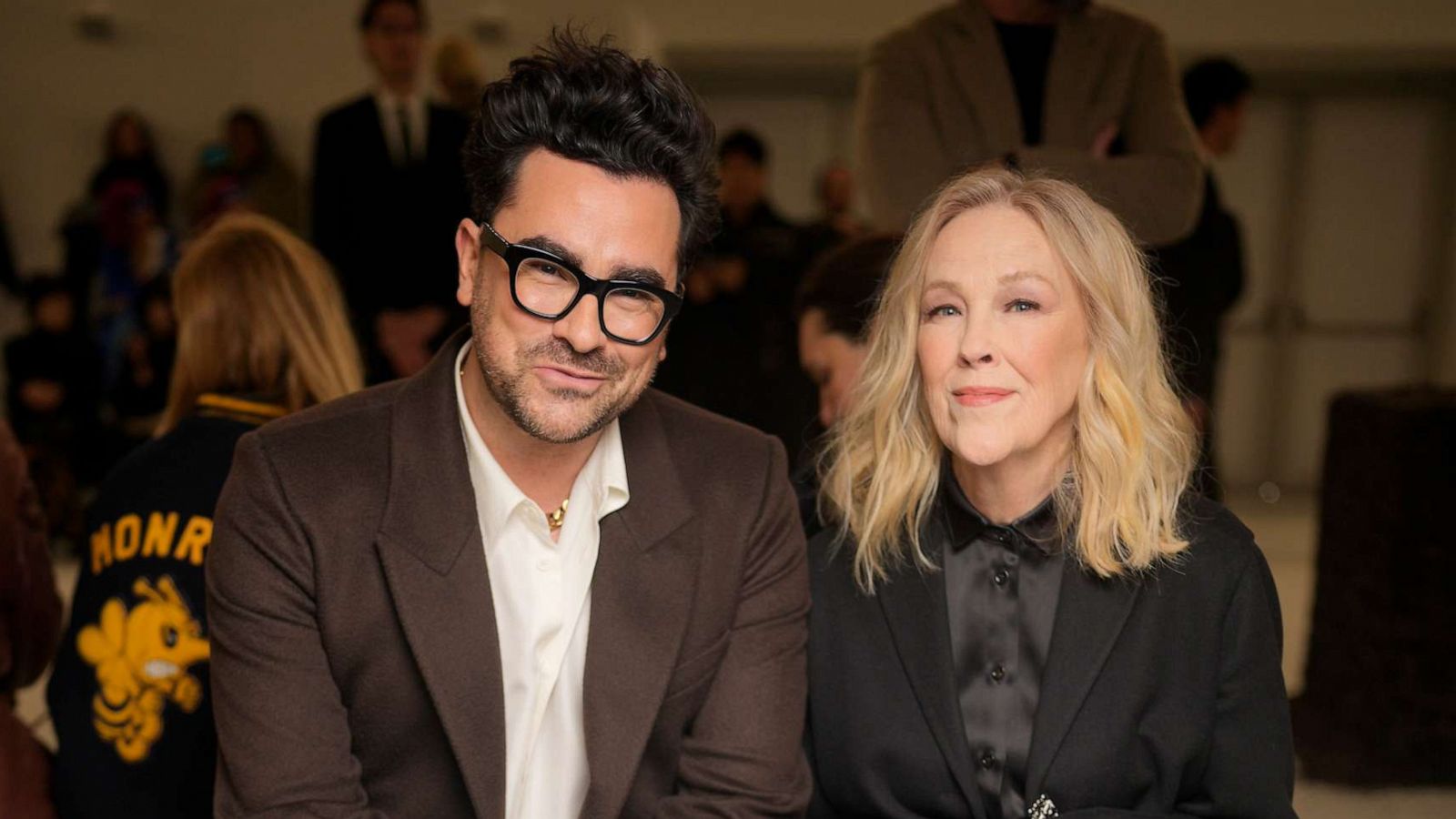 PHOTO: Dan Levy and Catherine O'Hara at Loewe Fall 2023 Ready To Wear Runway Show at Chateau de Vincennes, March 3, 2023, in Paris.