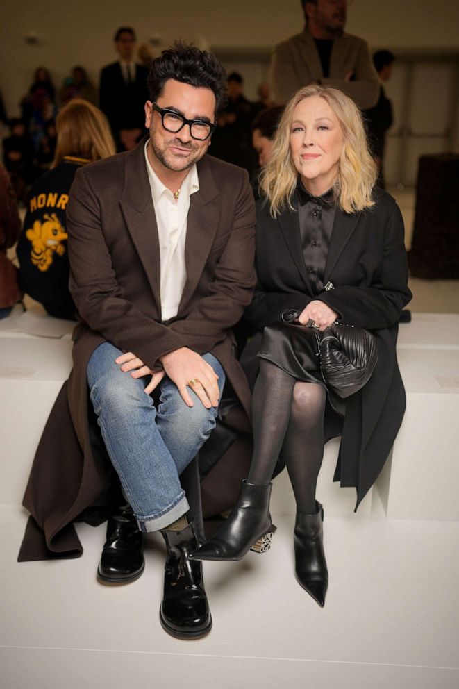 PHOTO: Dan Levy and Catherine O'Hara at Loewe Fall 2023 Ready To Wear Runway Show at Chateau de Vincennes, March 3, 2023, in Paris.