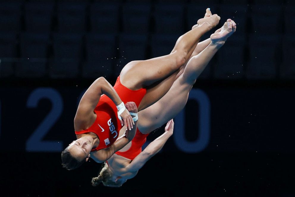 PHOTO: Jessica Parratto and Delaney Schnell of the Untied States in action during the women's 10m platform synchro event at the Olympics in Tokyo, July 27, 2021.