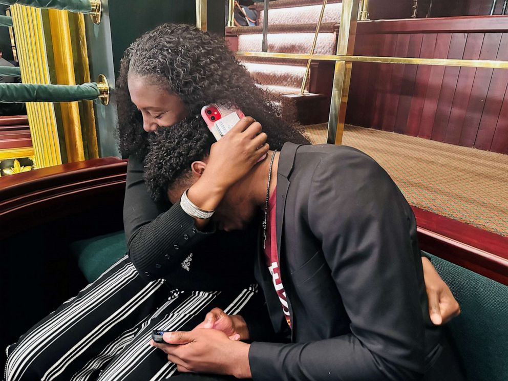 PHOTO: Amir Staten hugs his mom Karlynne Staten after learning he earned a scholarship to Morehouse College.