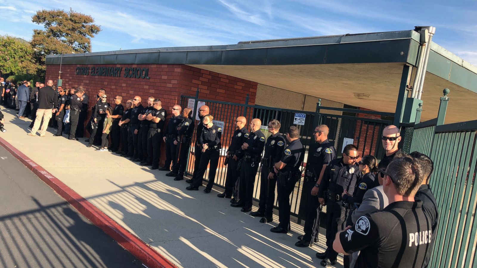 PHOTO: Gregg Casillas, 4, son of Officer Greggory Casillas, received a warm welcome on the way to school by his father's colleagues.