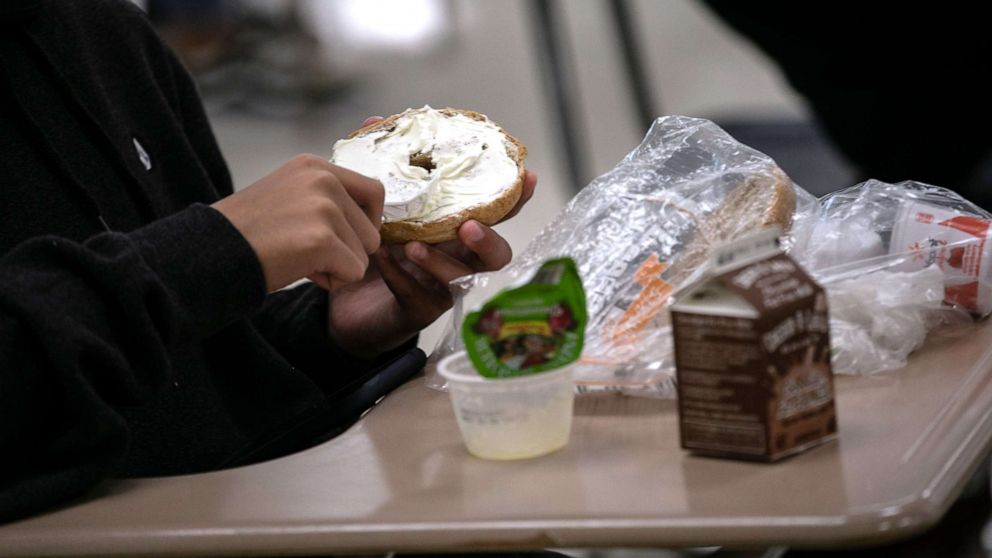 PHOTO: A student prepares lunch in the cafeteria during the first day of school at Stamford High School on Sept. 08, 2020, in Stamford, Conn.