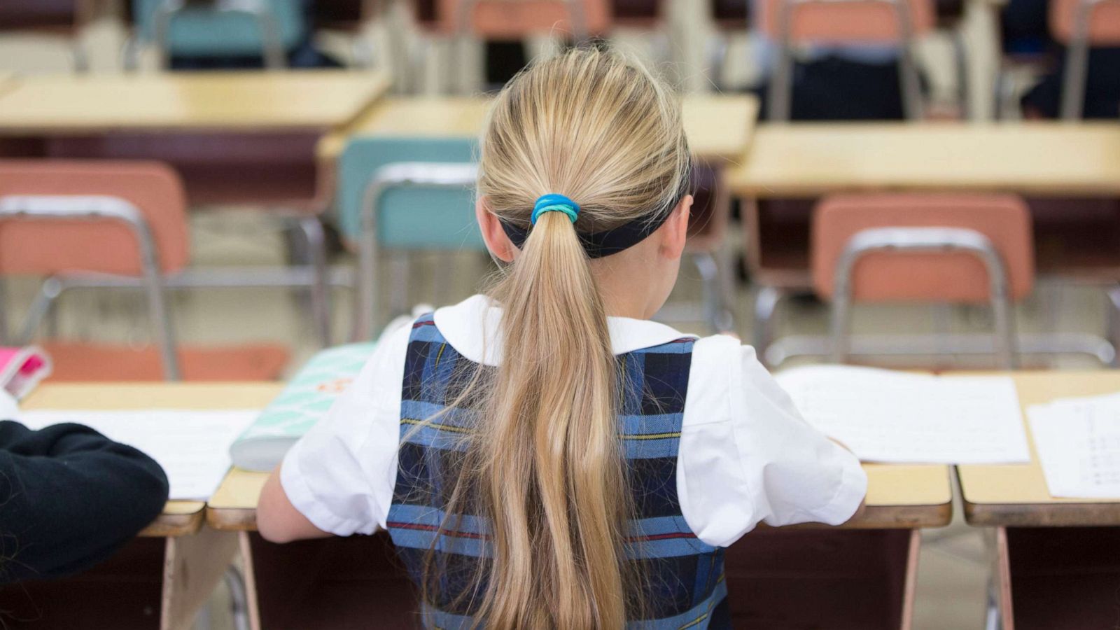 PHOTO: Stock photo of child wearing a school uniform.