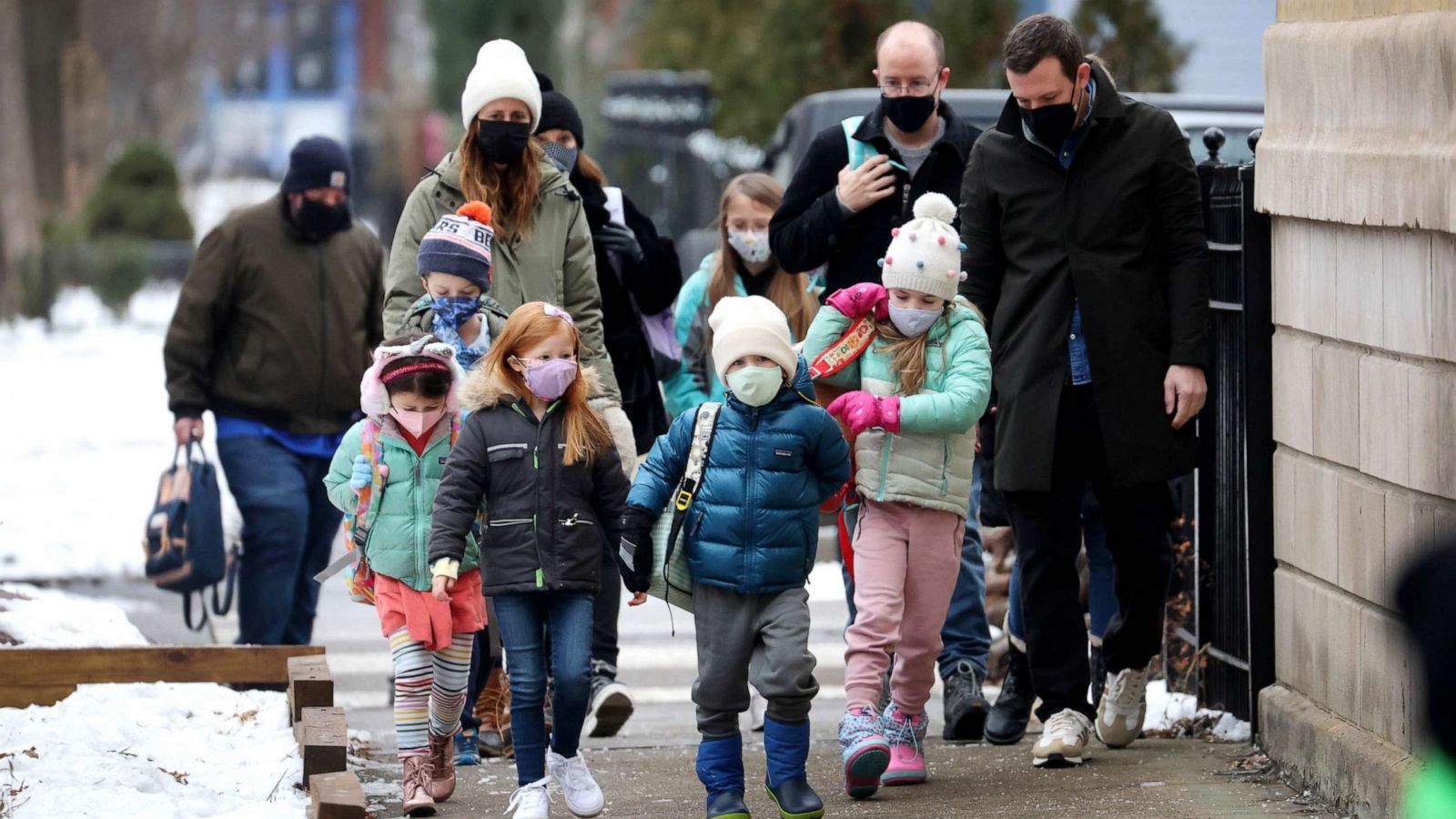 PHOTO: Students walk to elementary school in Chicago, Jan. 12, 2022.