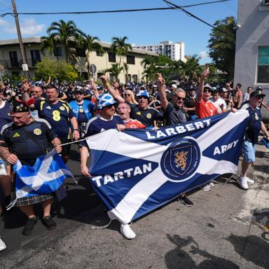 PHOTO: Scotland soccer fans march with the Tartan Army from Miami's Little Havana neighborhood on their way to watch a Miami Marlins baseball game, on June 22, 2026.