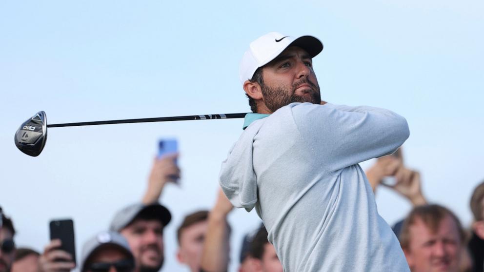 PHOTO: Scottie Scheffler of the United States plays off the 14th tee during a practice round for the British Open golf championship at the Royal Portrush Golf Club, Northern Ireland, July 16, 2025.