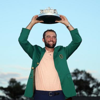 PHOTO: In this April 14, 2024, file photo, Scottie Scheffler of the United States poses with the Masters trophy after winning the 2024 Masters Tournament at Augusta National Golf Club in Augusta, Georgia. 