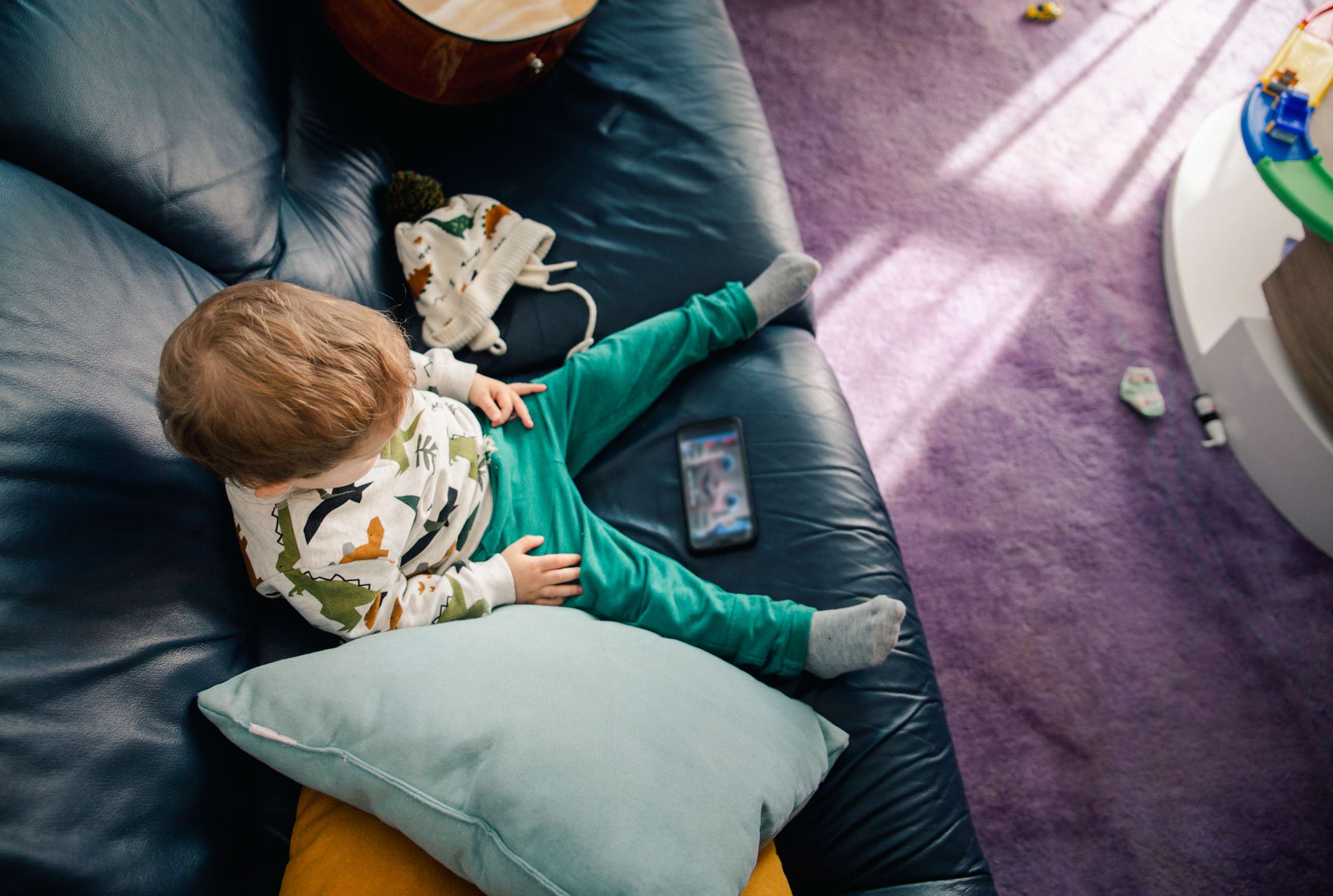 PHOTO: In this stock photo, a toddler watches cartoons on the phone.