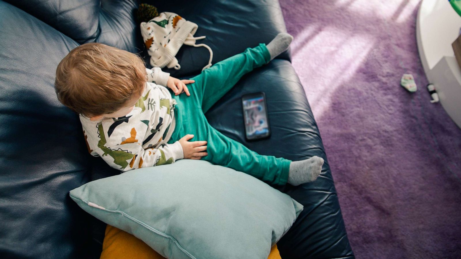 PHOTO: In this stock photo, a toddler watches cartoons on the phone.