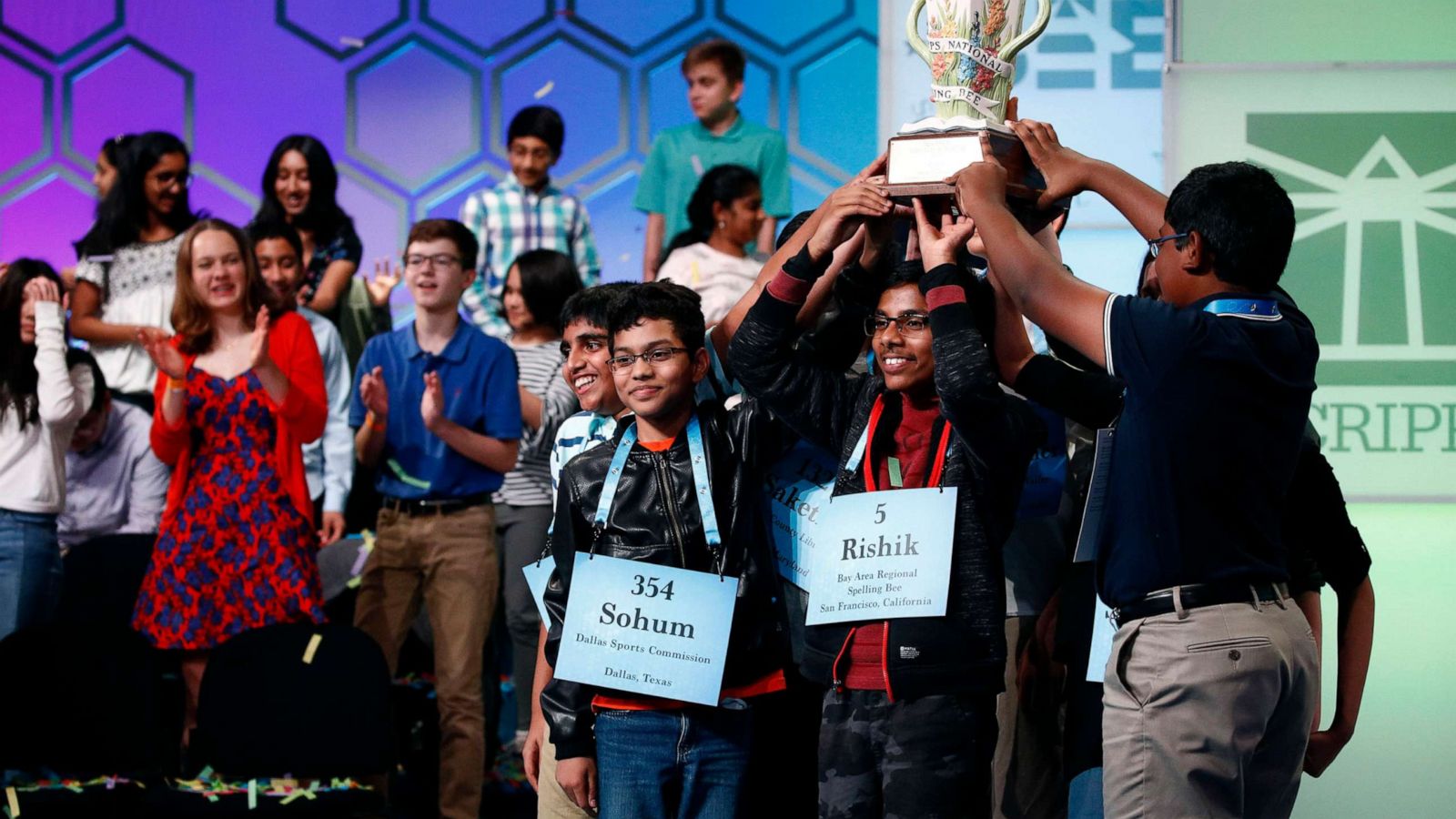 PHOTO: In this May 31, 2019 file photo, eight co-champions celebrate after winning the Scripps National Spelling Bee, in Oxon Hill, Md.