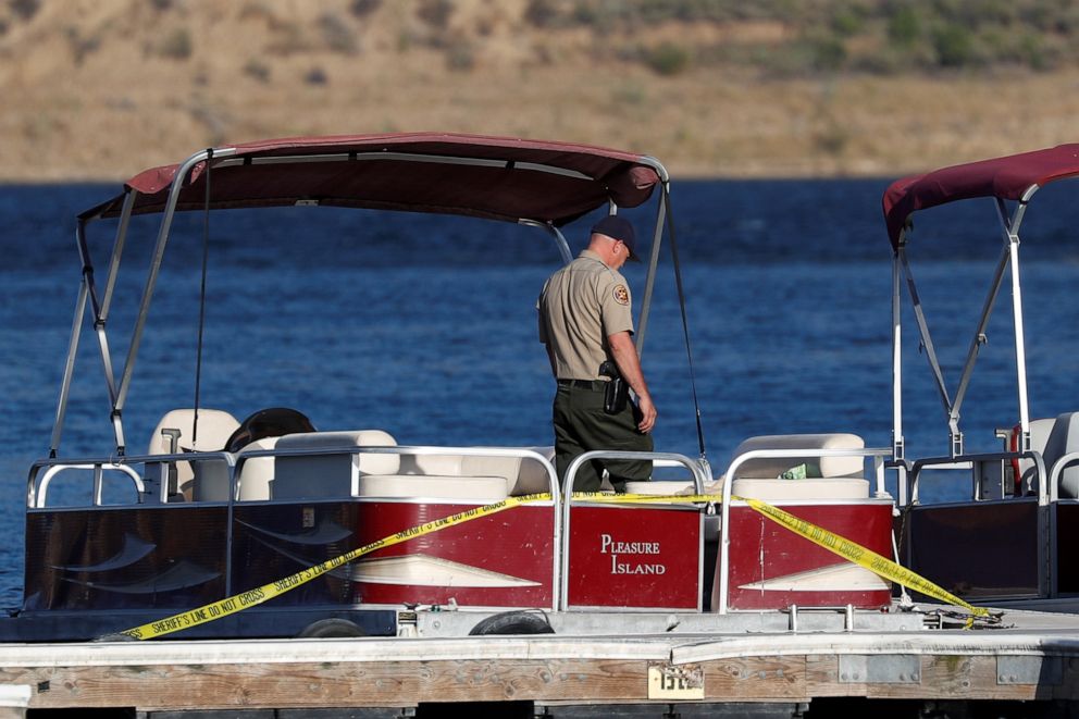 PHOTO: A member of law enforcement is seen on the boat that actor Naya Rivera was using when she went missing, on Lake Piru, Calif., July 9, 2020.