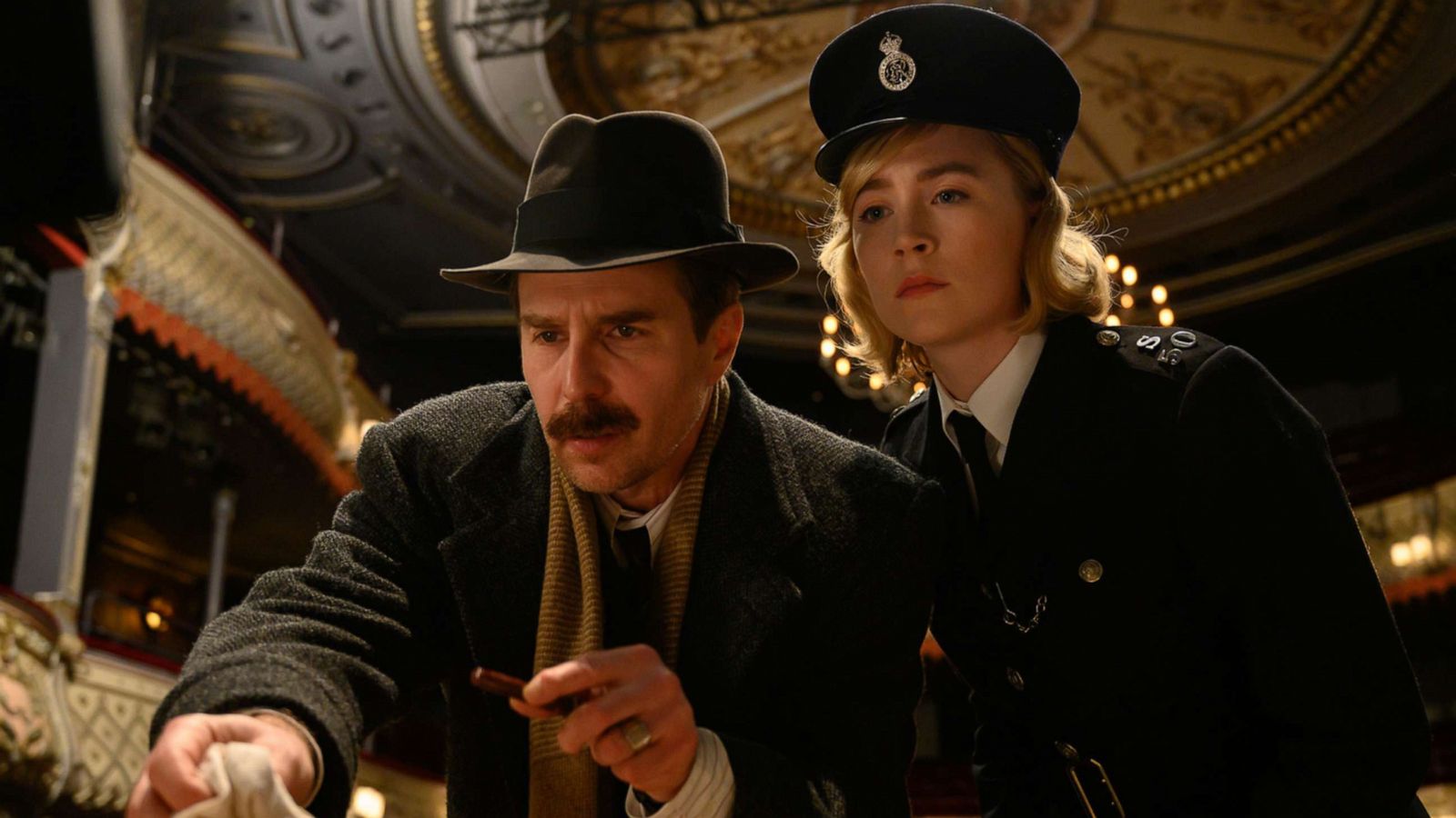 PHOTO: Sam Rockwell and Saoirse Ronan in the film "See How They Run".