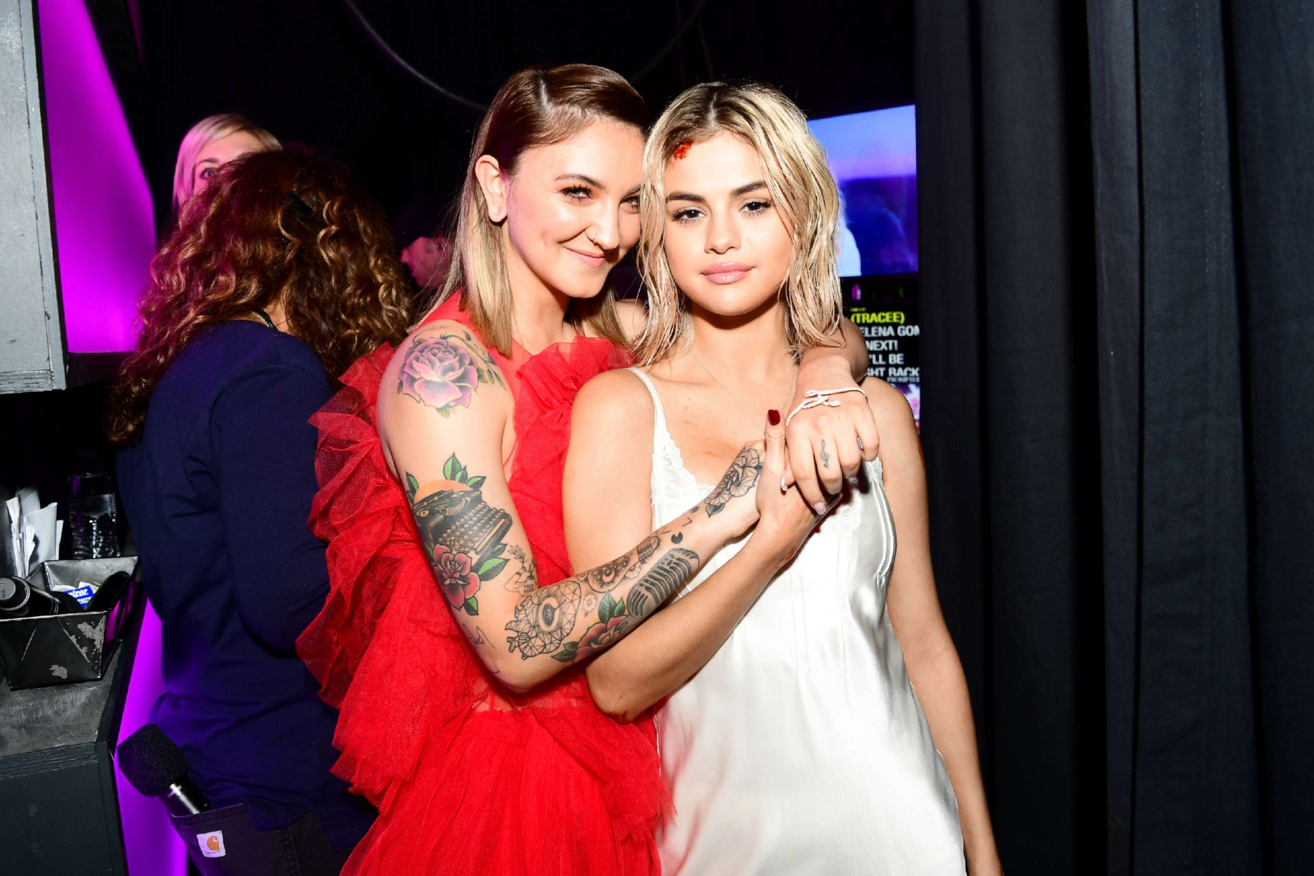 PHOTO: Julia Michaels, left, and Selena Gomez pose backstage during an event in Los Angeles, Nov. 19, 2017.