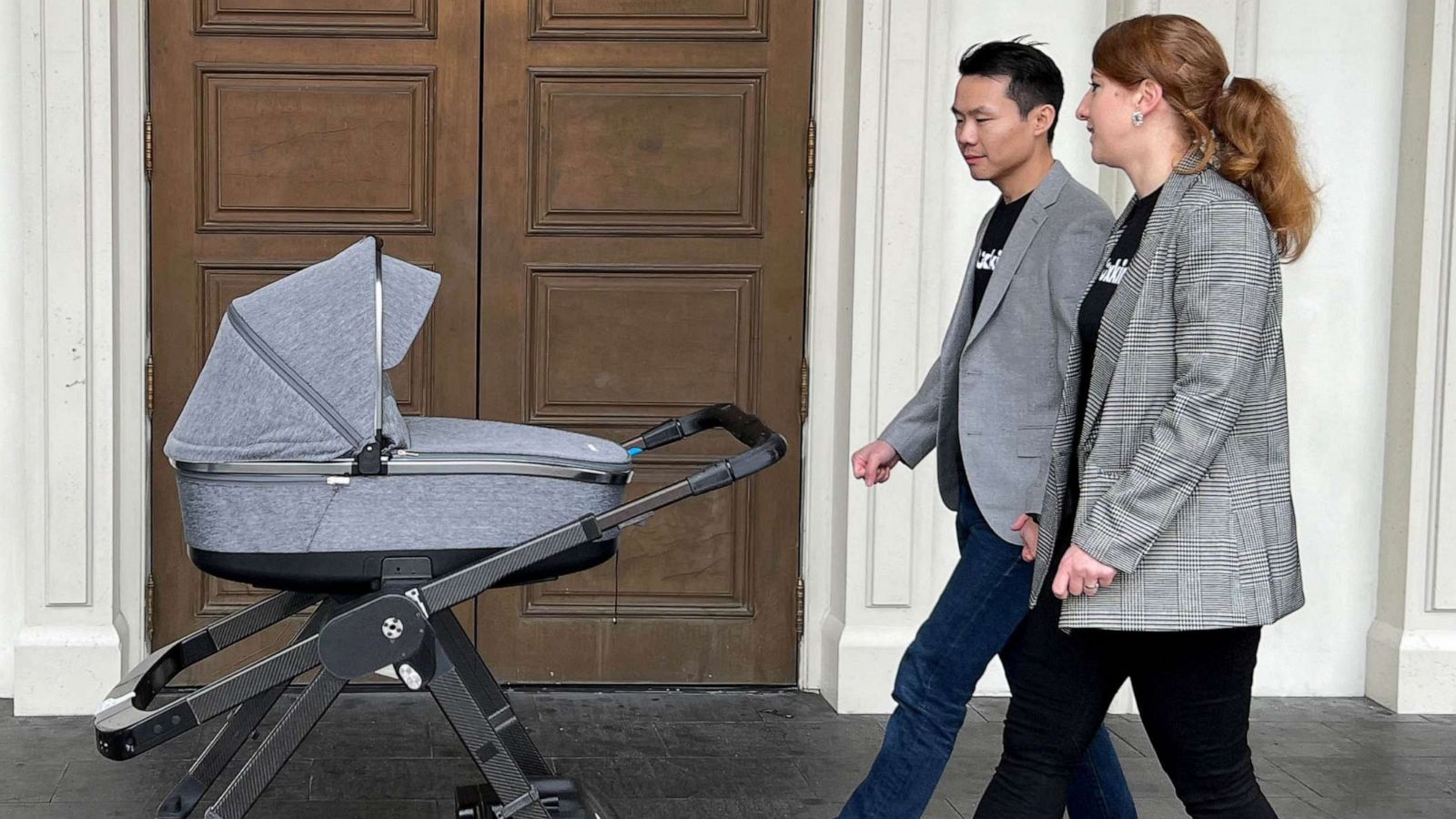 PHOTO: Canadian startup Gluxkindâs co-founder and CEO Kevin Huang, and his wife, Gluxkind Co-Founder and CPO Anne Hunger, walk with their "Ella" hands-free stroller near the strip in Las Vegas, Nevada, Jan. 4, 2023.